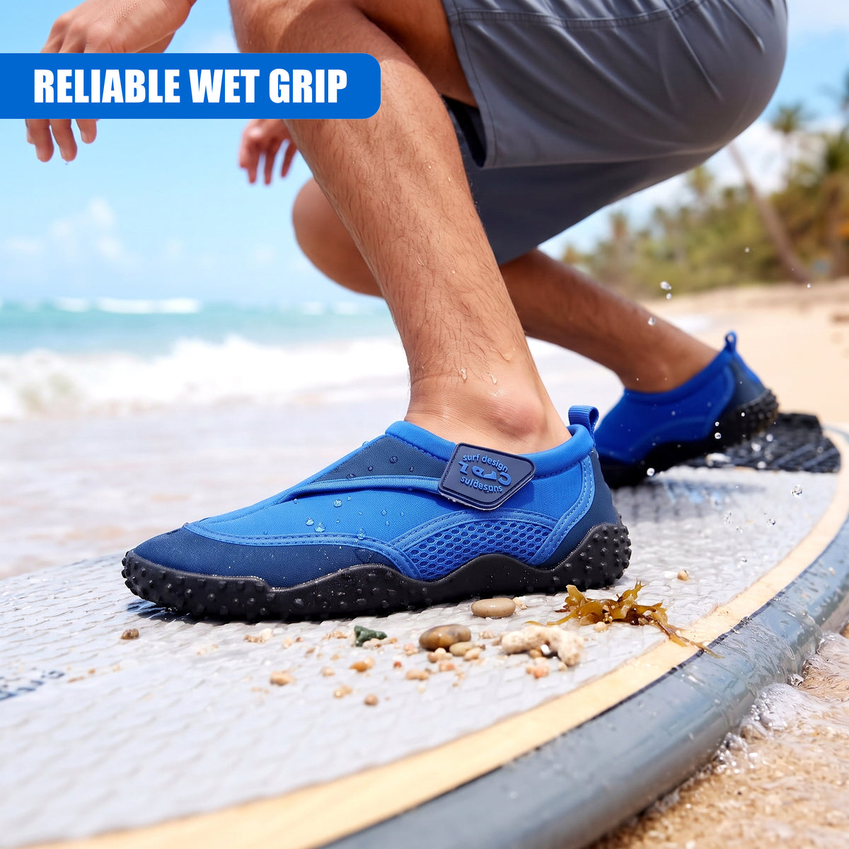 Blue neoprene aqua shoes for adults and kids on a beach, featuring a non-slip tread