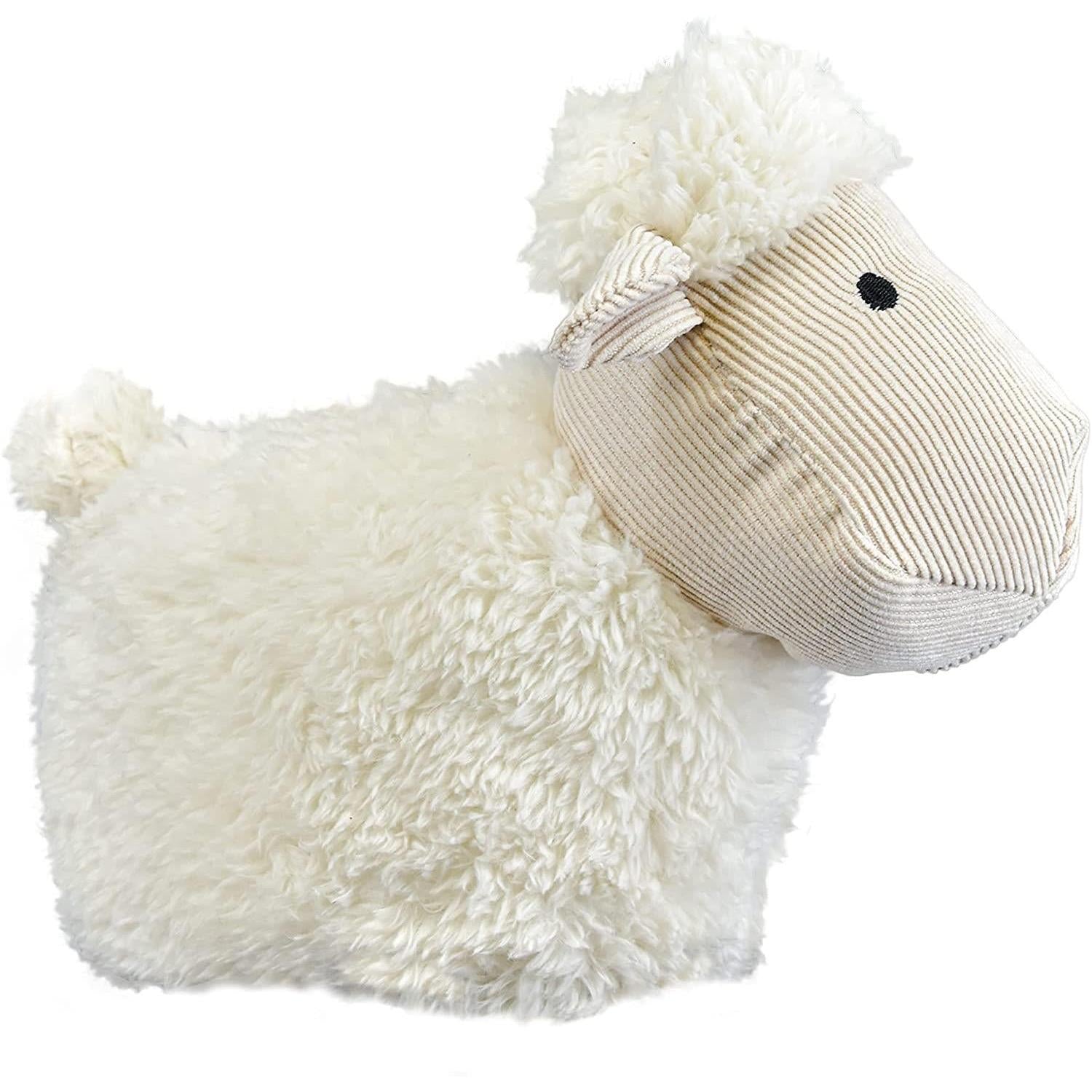 A plush white sheep-shaped pillow with a soft, fuzzy exterior and a ribbed, corded face. The face features a black eye and a small, flat, corded ear. The body is made of soft, fuzzy material, while the face is made of corded, ribbed material. The overall shape is a simple, stylized sheep, with no additional features or details. - The Magic Toy Shop