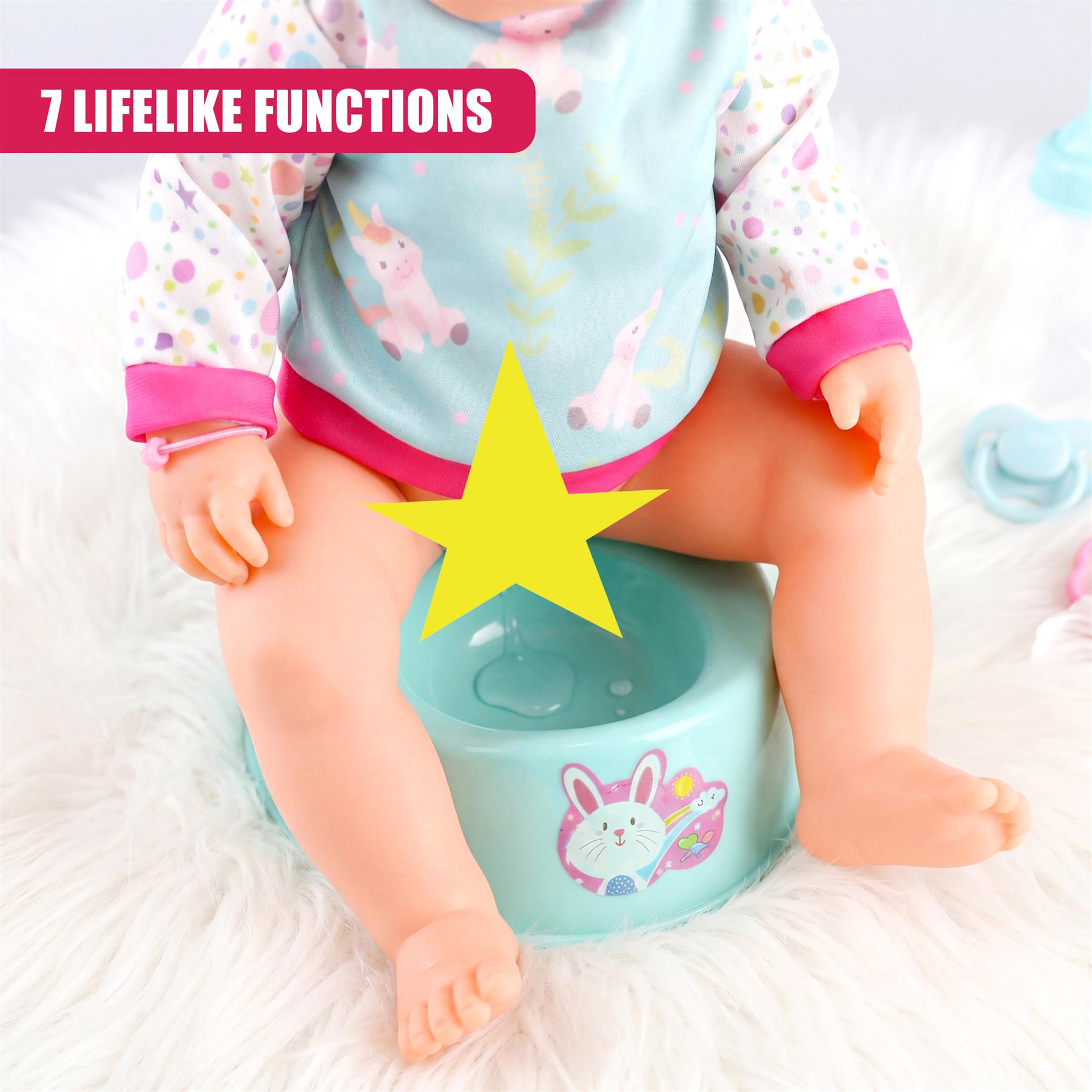 Doll wearing a patterned top sits on a round, light blue playset shaped like a baby bath.