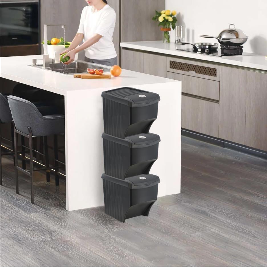 stacked trash cans in kitchen setting - The Magic Toy Shop