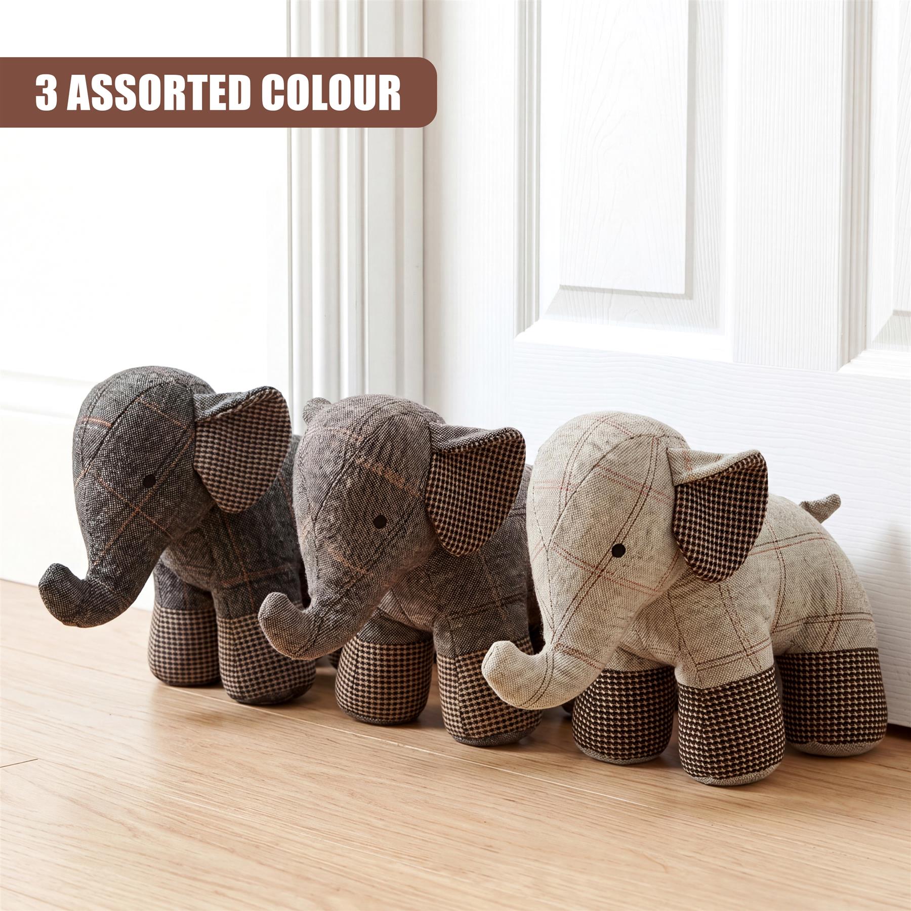 Three knitted elephant door stoppers featuring various plaid patterns are shown on a wooden floor.
