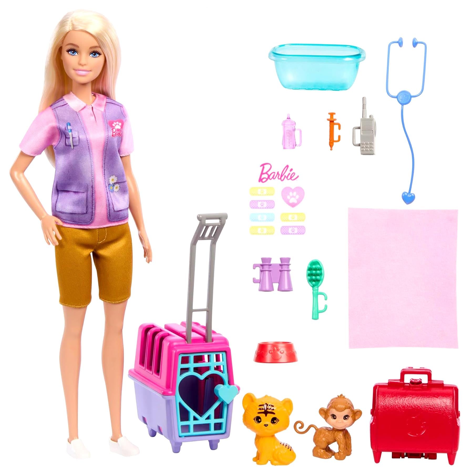 Blonde doll with animal rescue playset, medical accessories, and various toy tools.