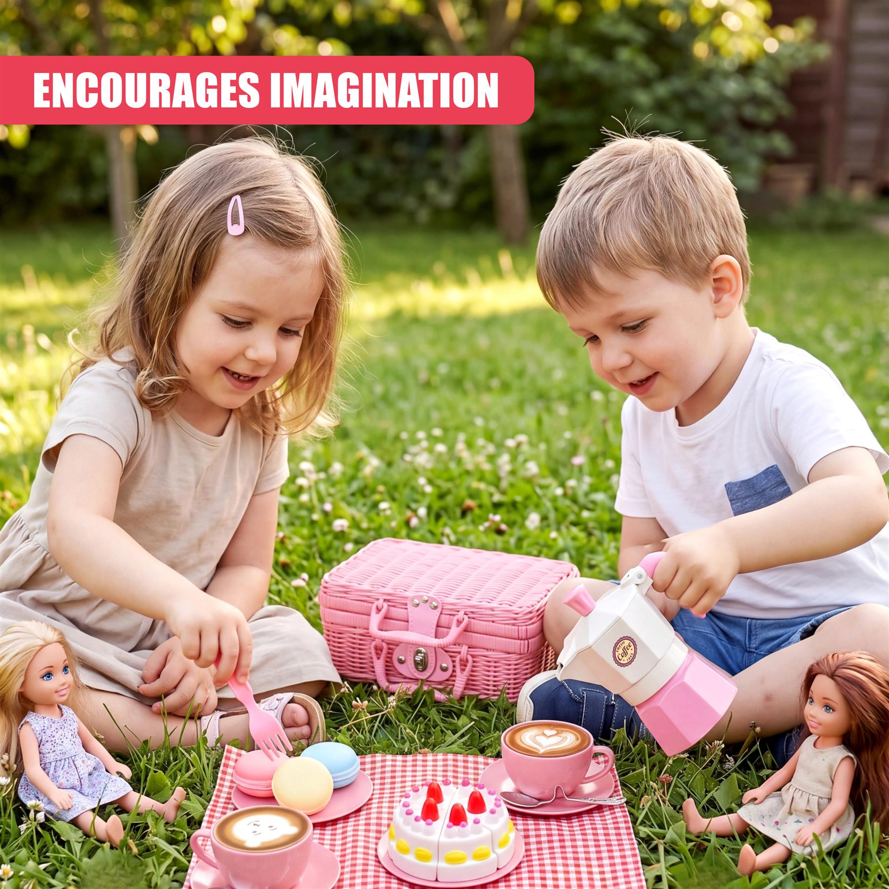 Children interact with a toy tea party set, picnic basket, cake, and dolls in a grassy outdoor setting.