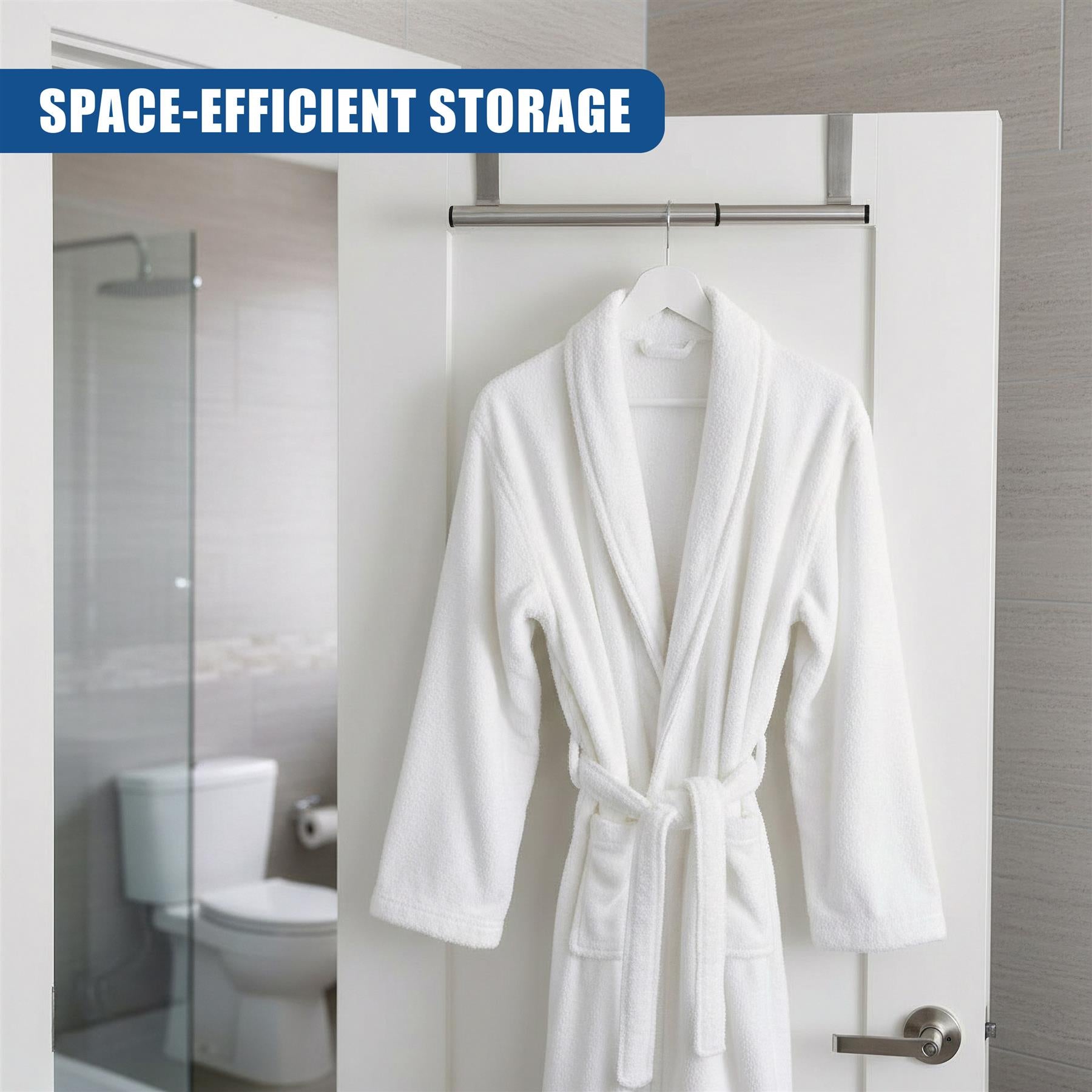 A metallic rail is mounted over a white door, holding a white bathrobe.