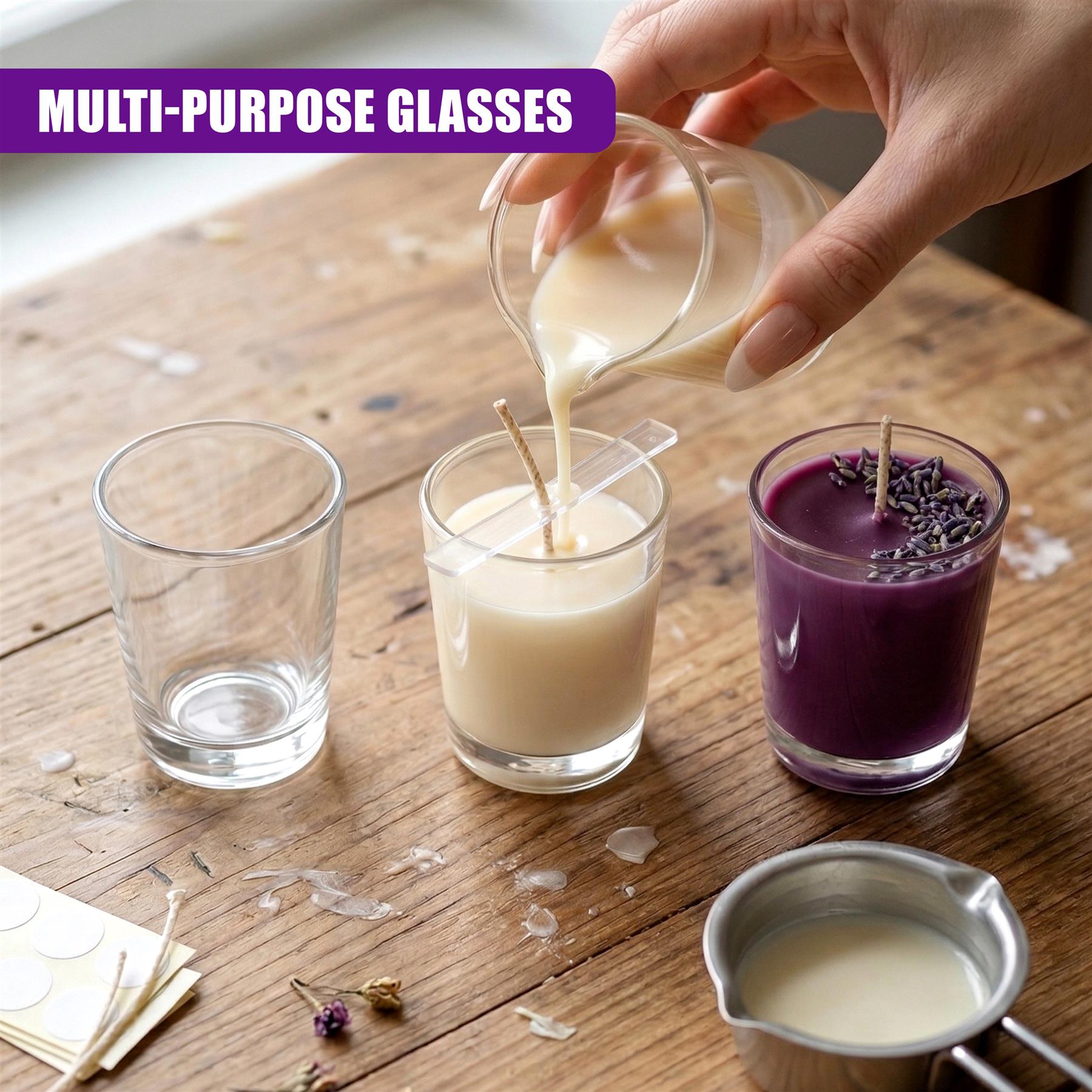 Hand pours white liquid into a small glass next to a purple dessert and empty glass.