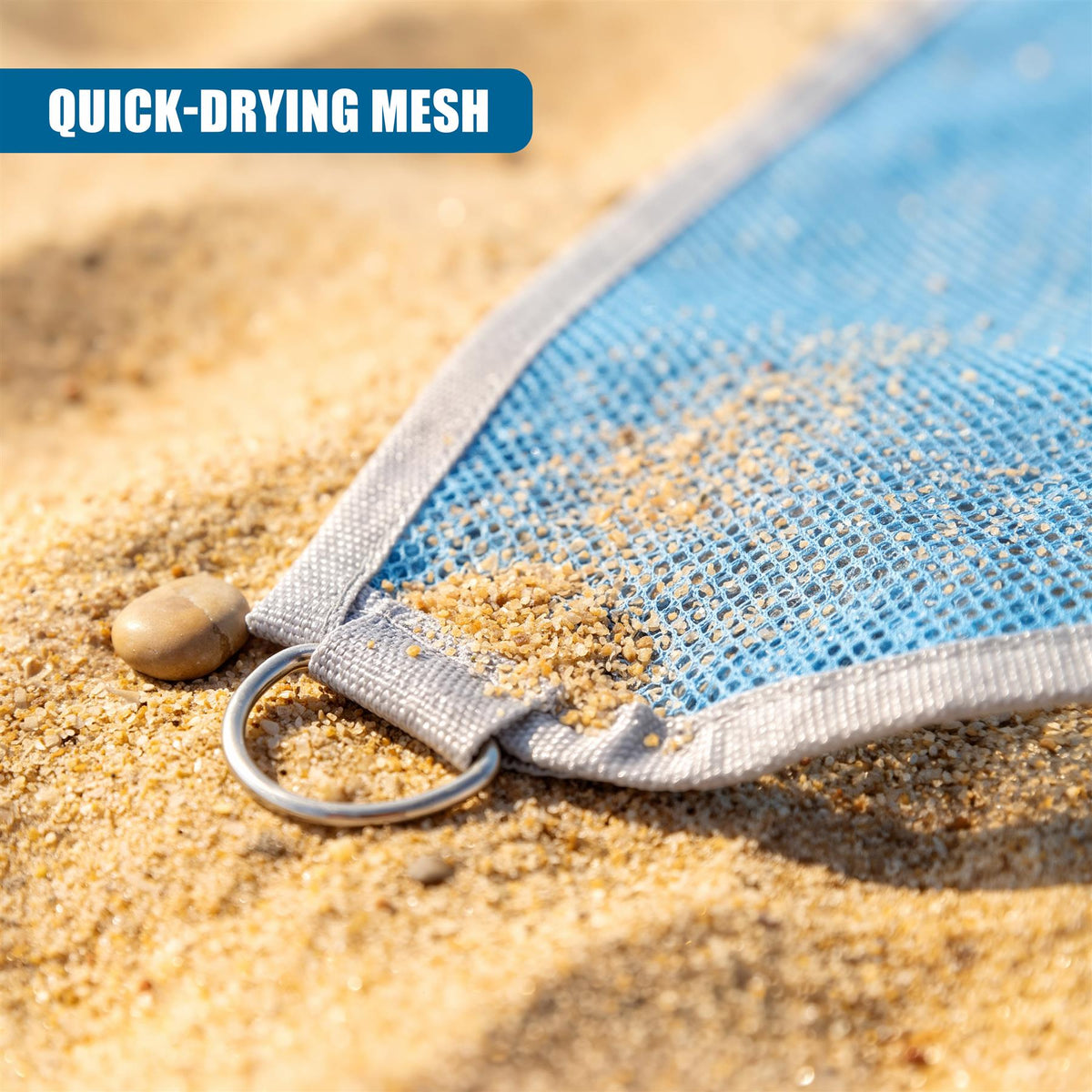 Blue GEEZY beach mat on sand, featuring quick-drying mesh and a sand-free design