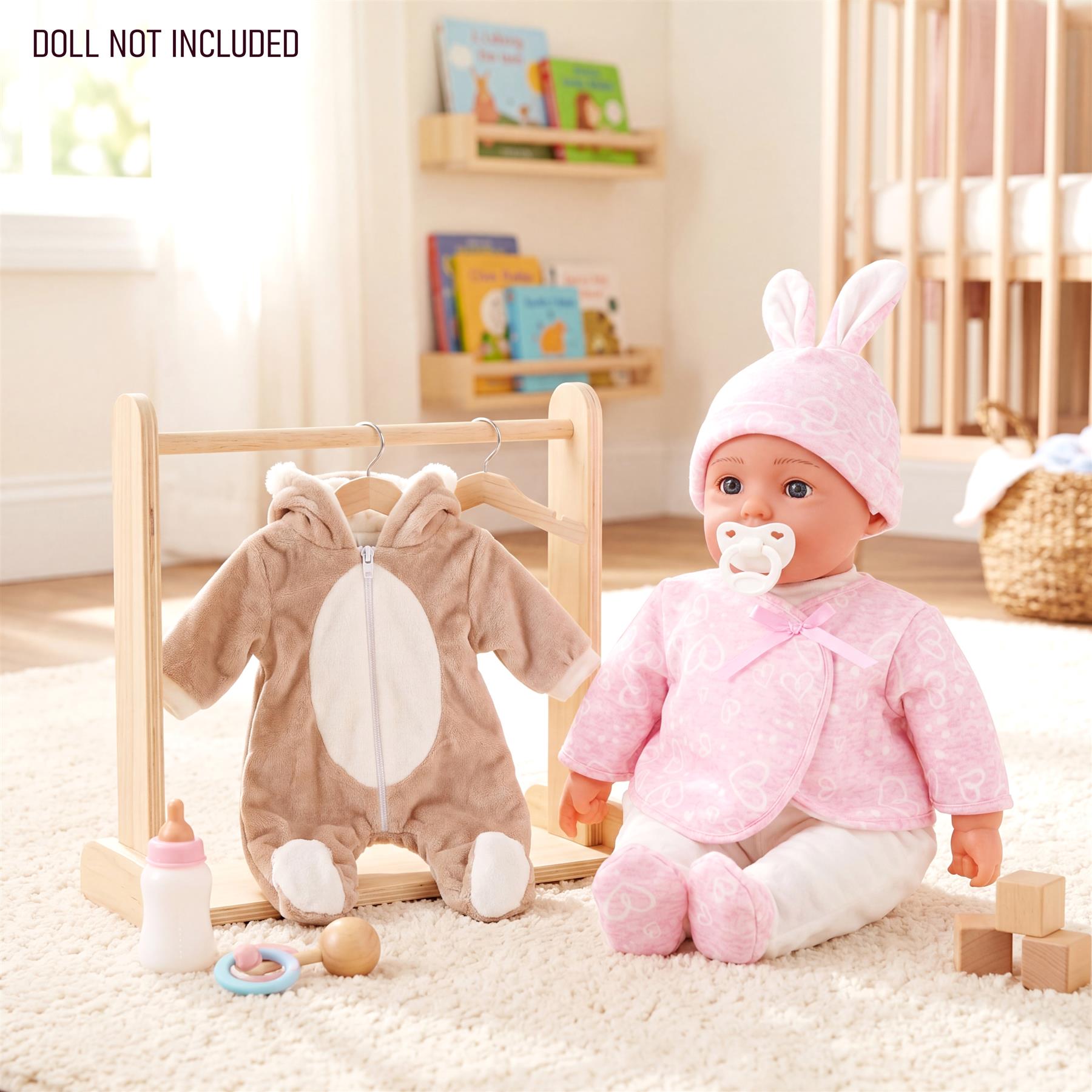 Doll wearing pink bunny costume and brown bear outfit displayed on a wooden stand.