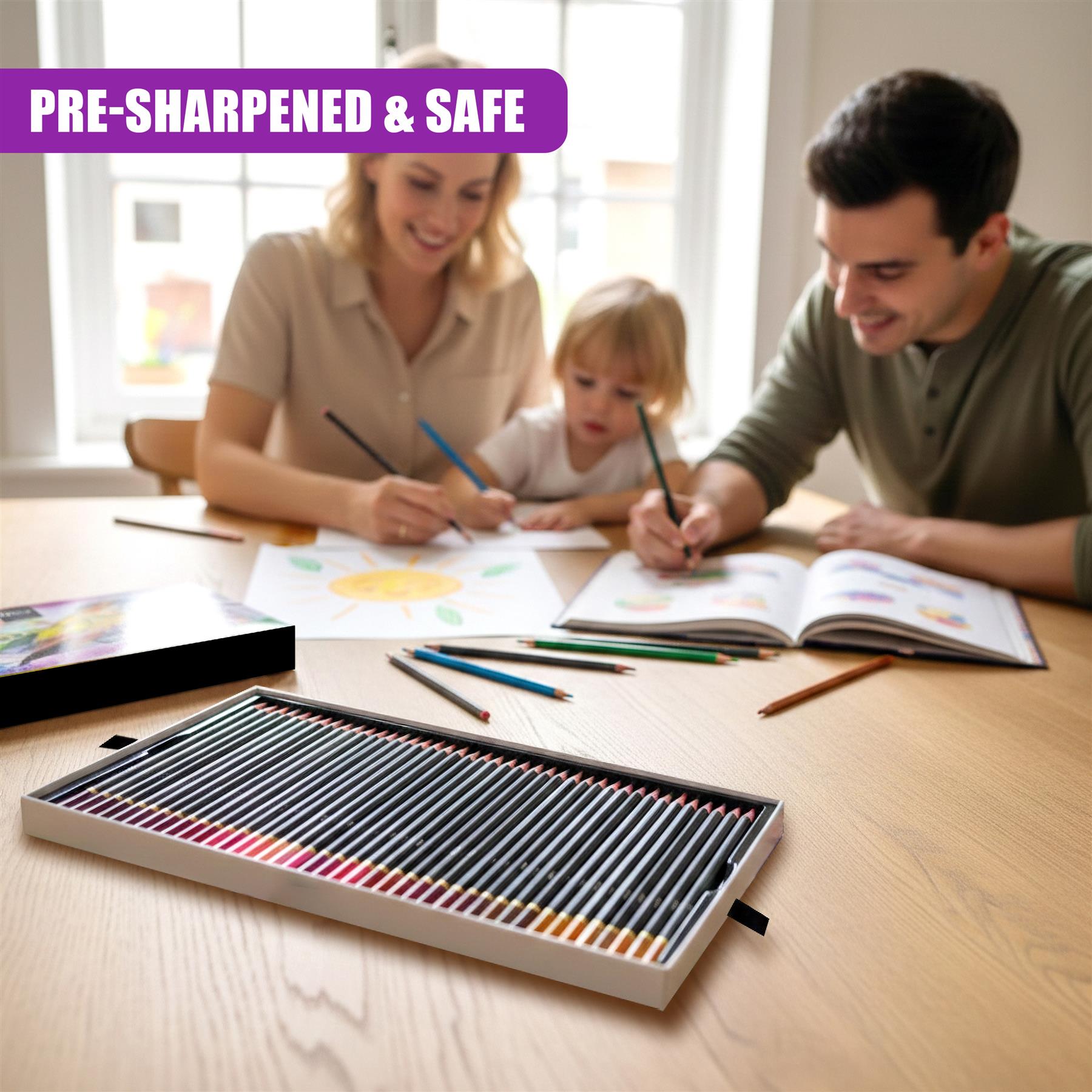 A boxed set of colored pencils rests on a table near a family coloring together.