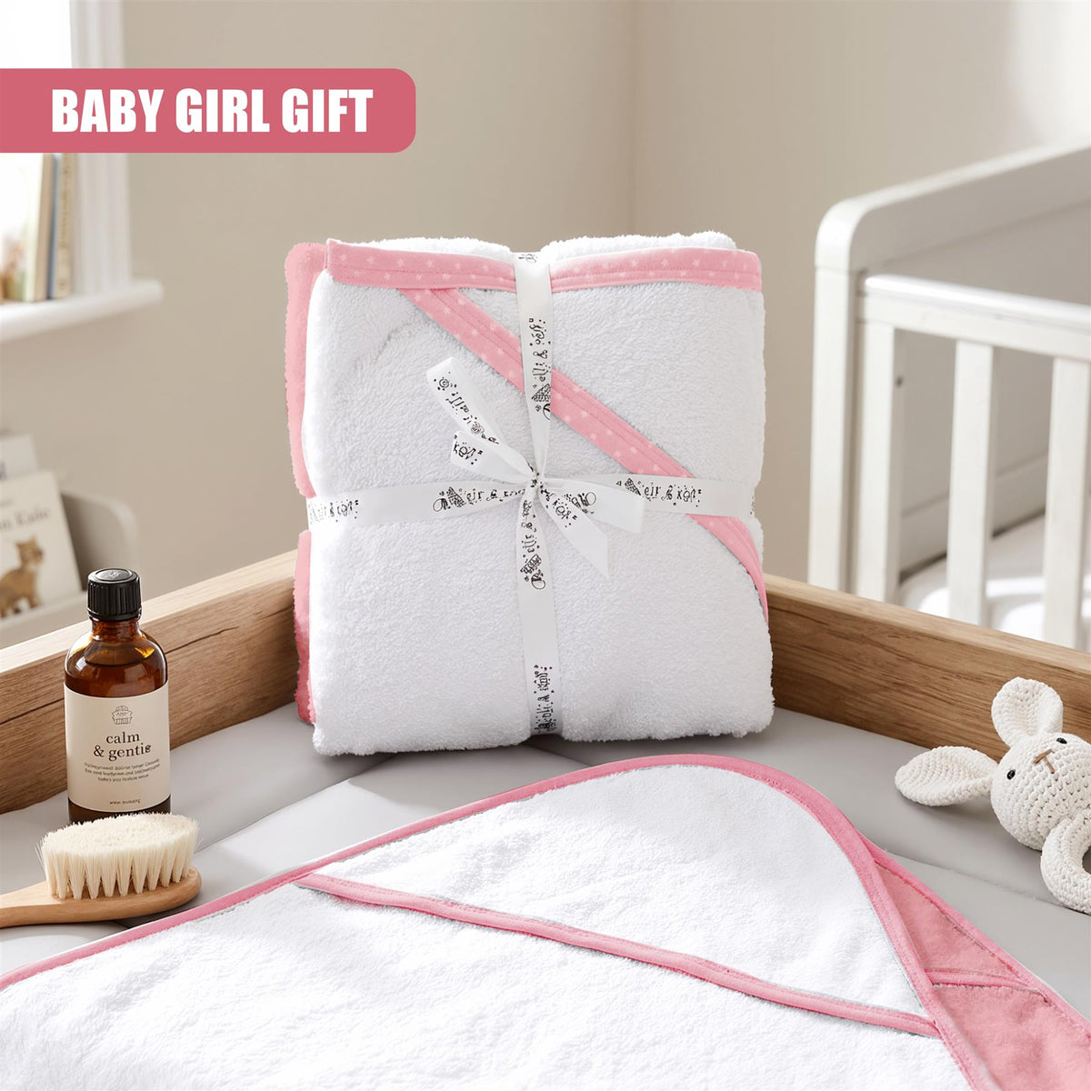 Pack of 2 hooded GEEZY baby bath towels in a pink and white baby gift set