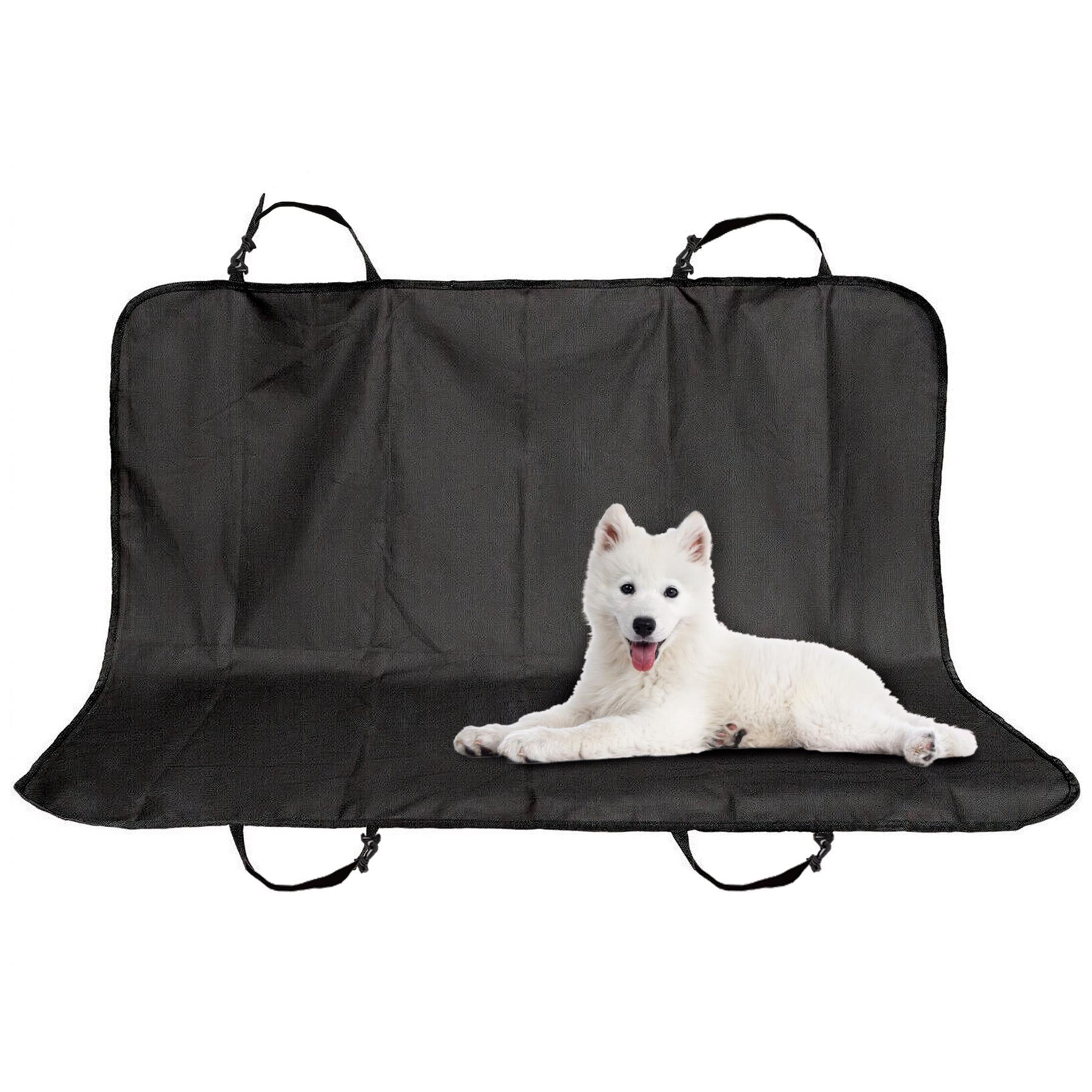 Black fabric dog car seat cover featuring adjustable straps and a white dog resting on it.
