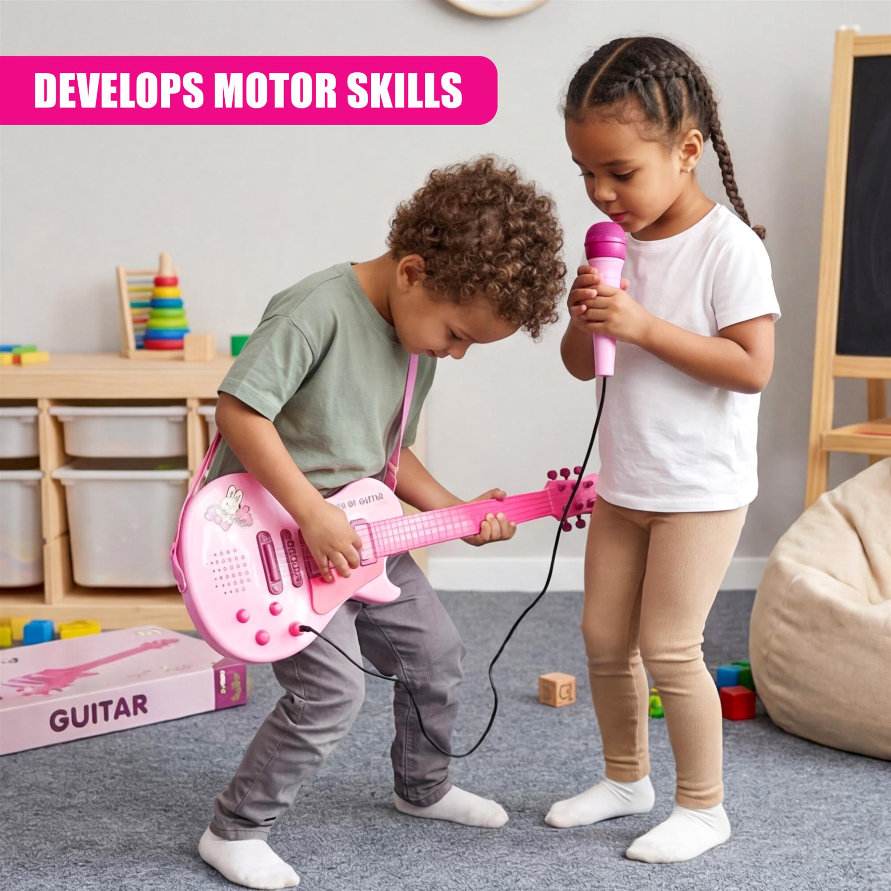 Two children playing together with a pink plastic guitar and microphone toy.