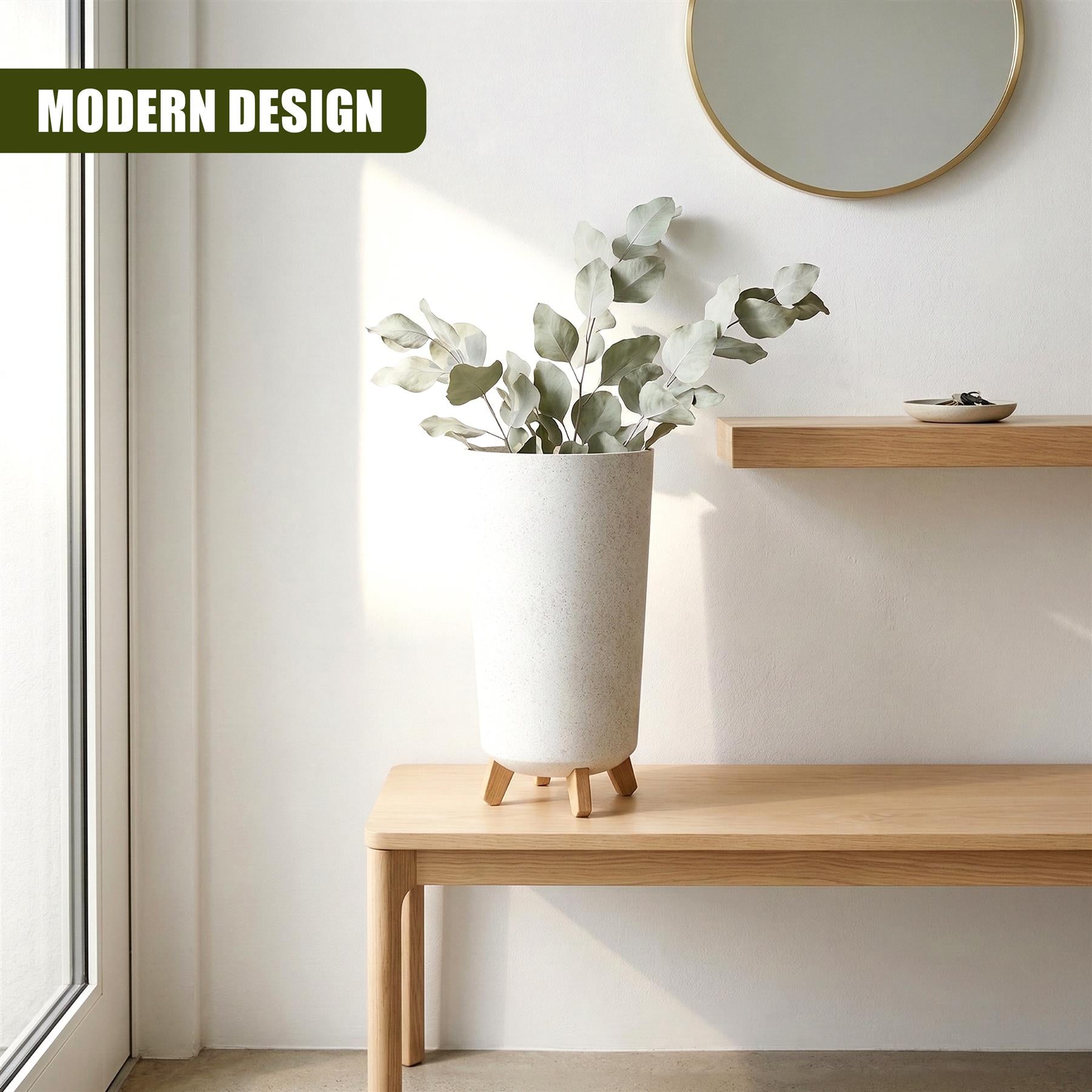 Tall, textured, light-colored ceramic pot with wooden legs displaying green foliage on a wood surface.