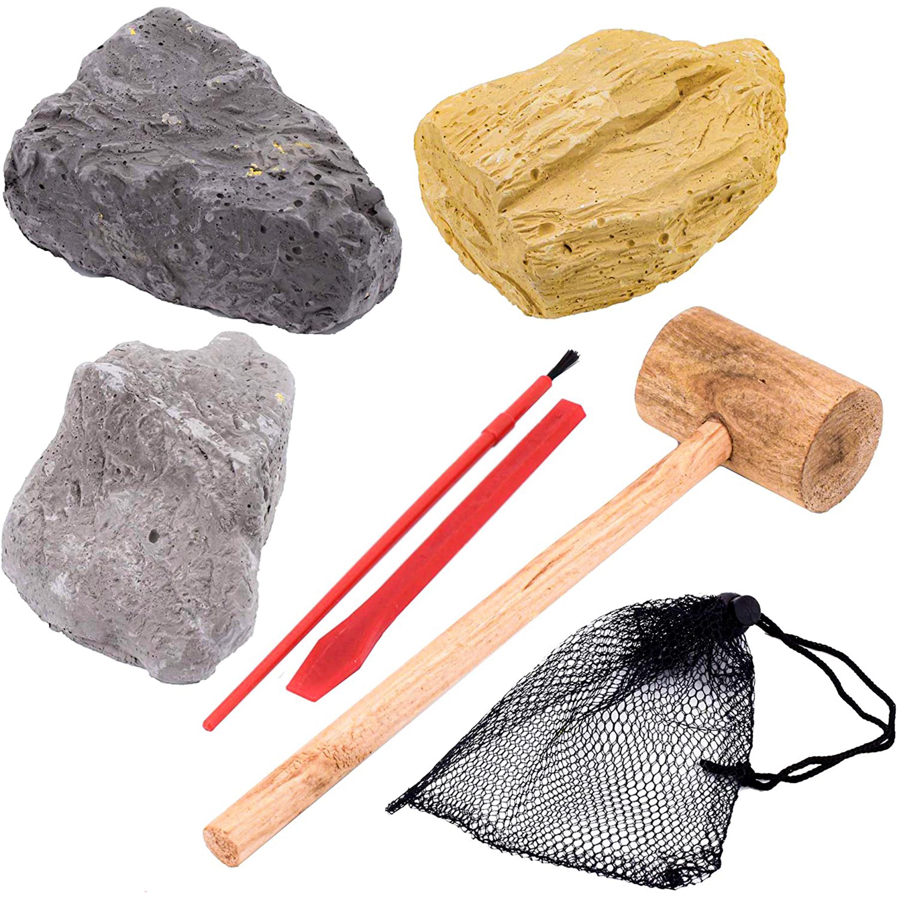 Collection of fake crystals, a wooden hammer, plastic tool, and black mesh bag for digging.
