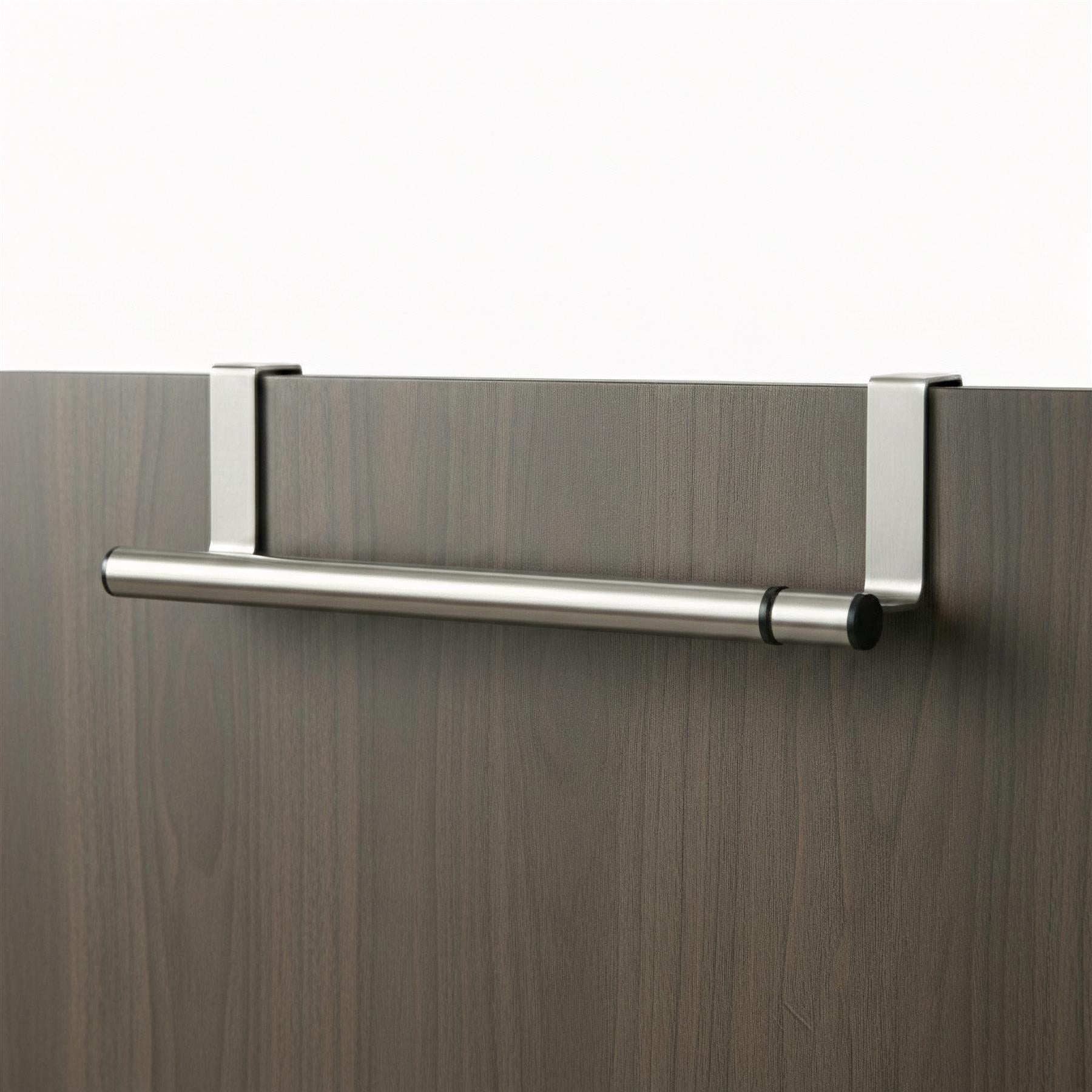 Extendable metal bar bracketed on either side, mounted horizontally to a dark wood grain surface.