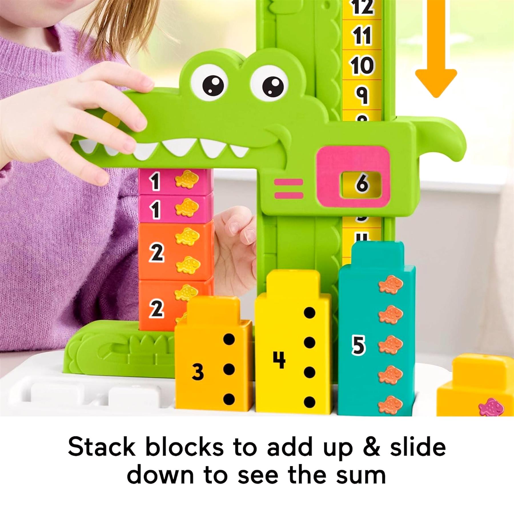 Green alligator toy with stackable number blocks for learning addition and counting.