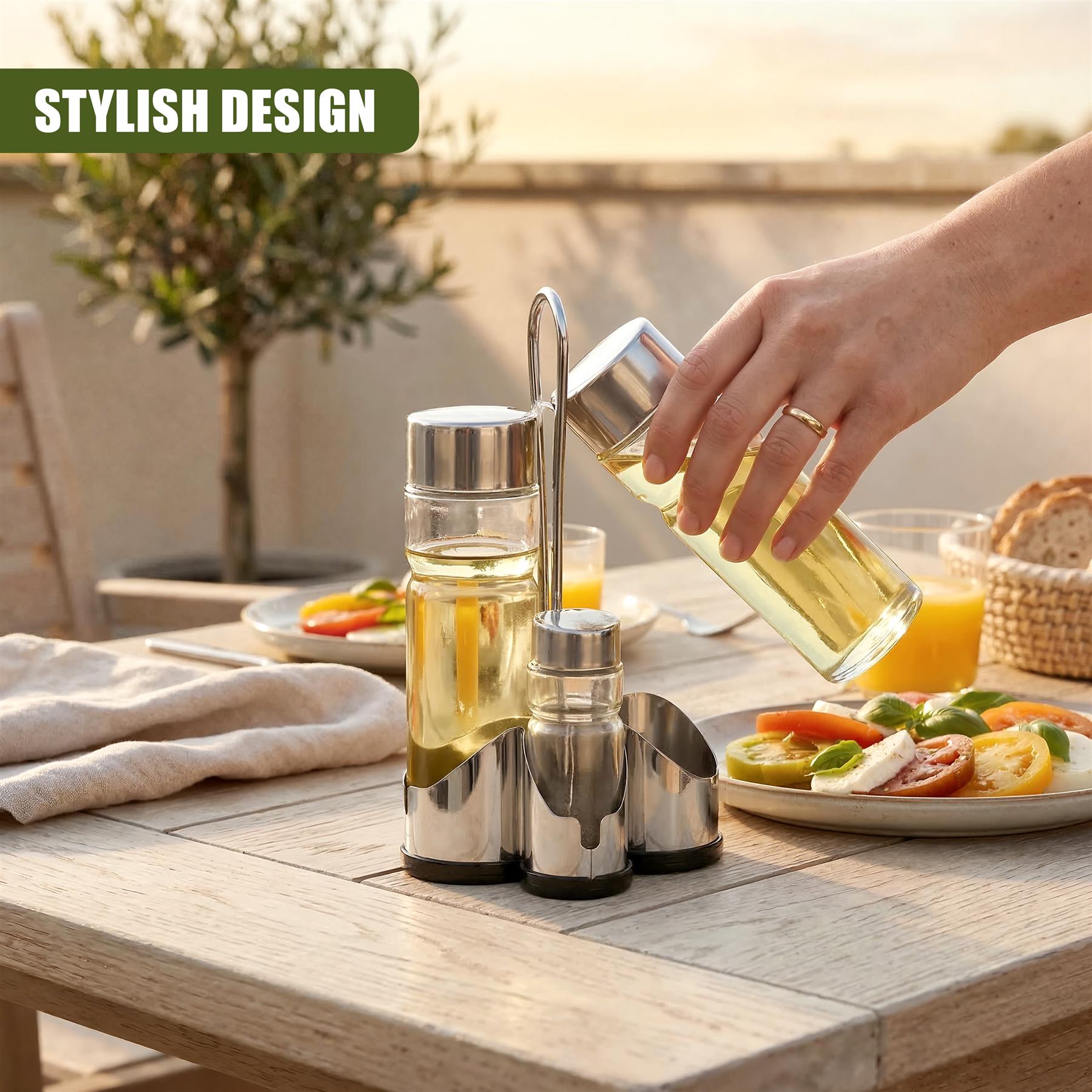 Stainless steel condiment set with dispensers and small creamer, styled on a wooden table.