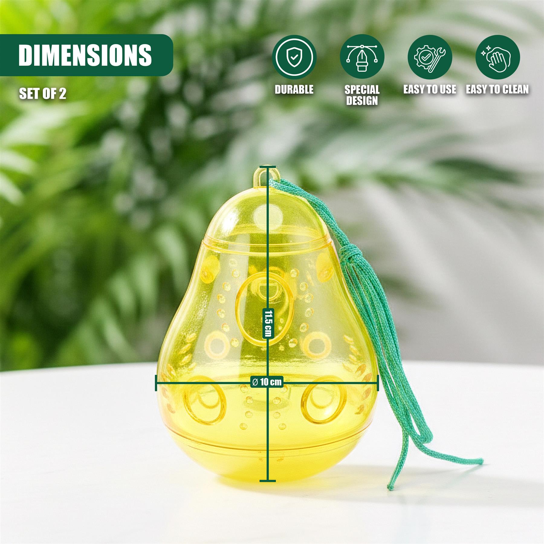 A pair of yellow, bell-shaped traps designed to catch wasps, hanging from a green string.