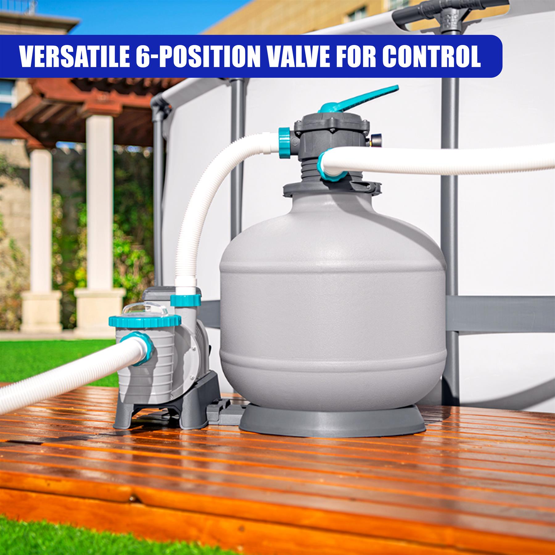 A gray sand filter tank connected to a pump and manifold valves for water filtration.