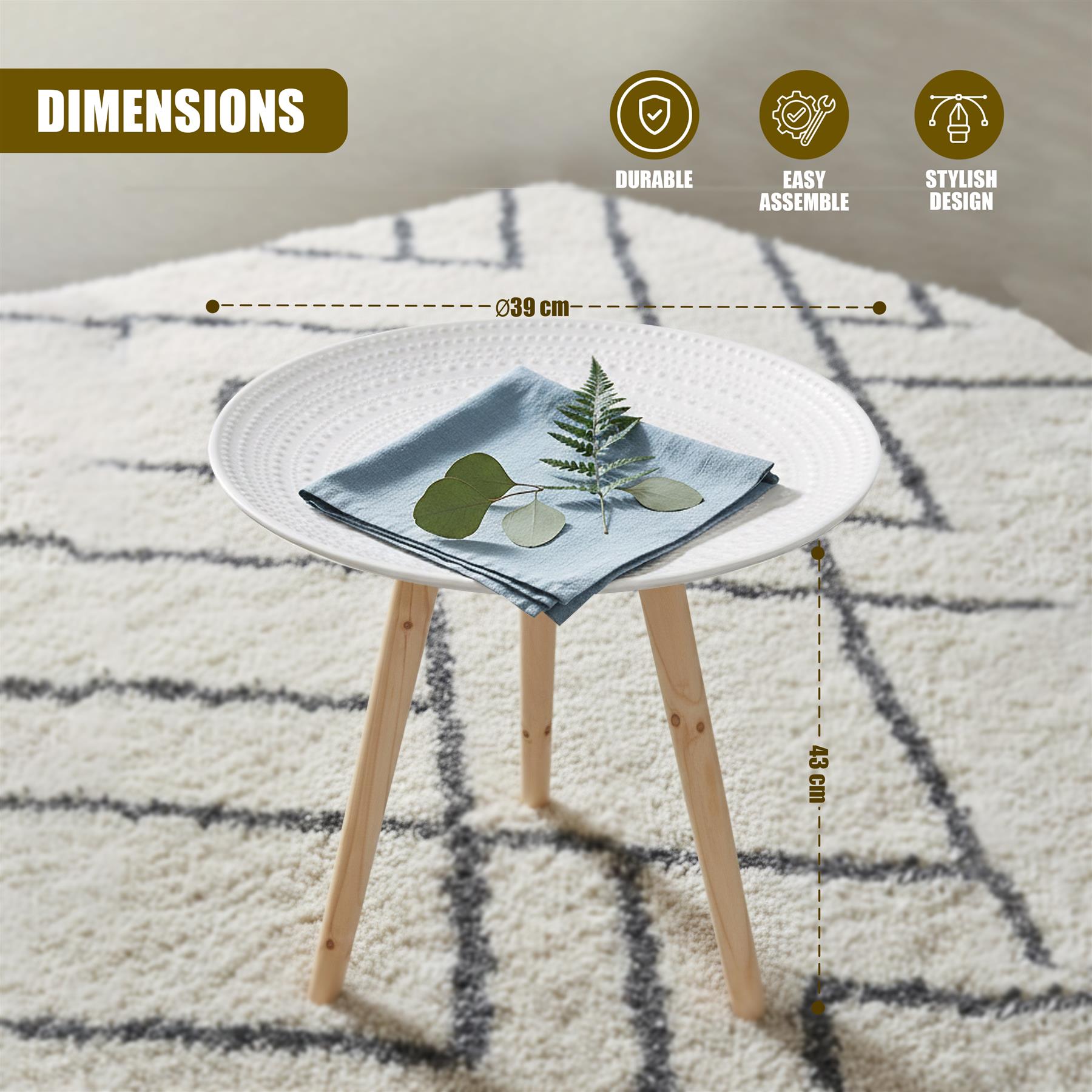 A round white side table with three light wooden legs sits on a patterned rug.