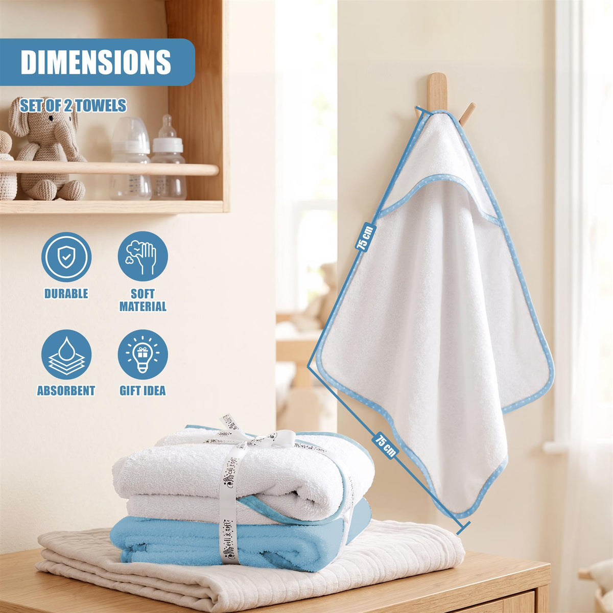 Pack of 2 hooded GEEZY baby bath towels displayed with a set of baby essentials