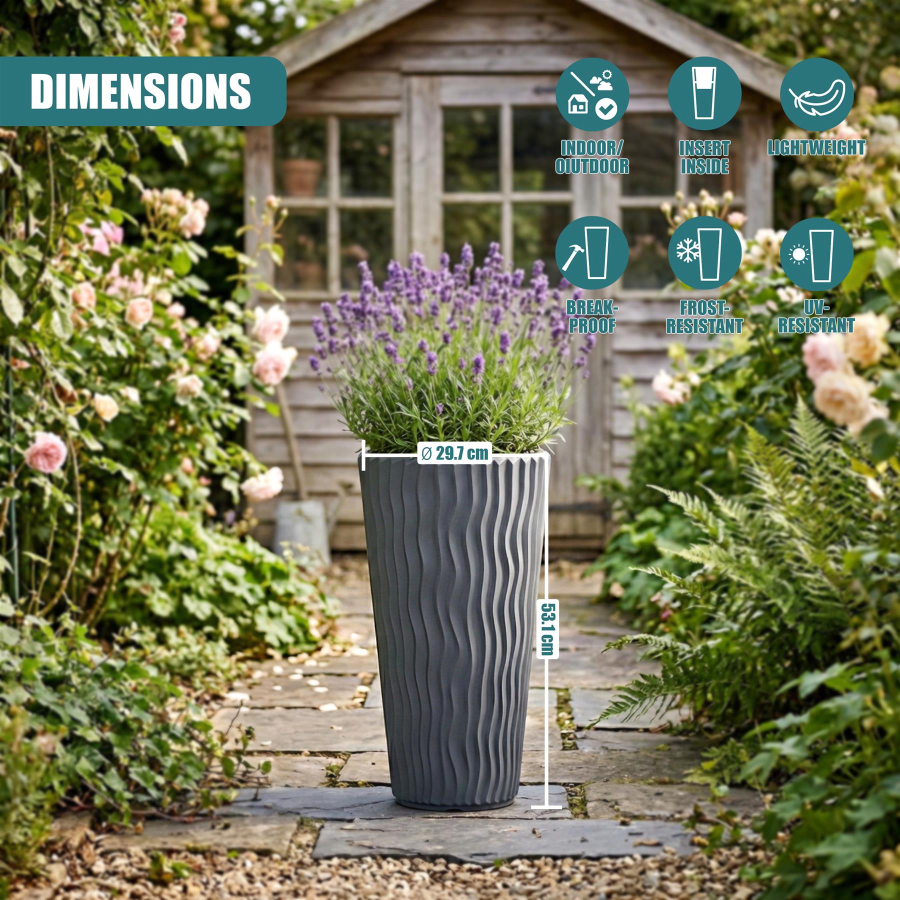 The tall, ribbed, anthracite flower pot measures 53.1 by 29.7 centimeters and holds purple blossoms.