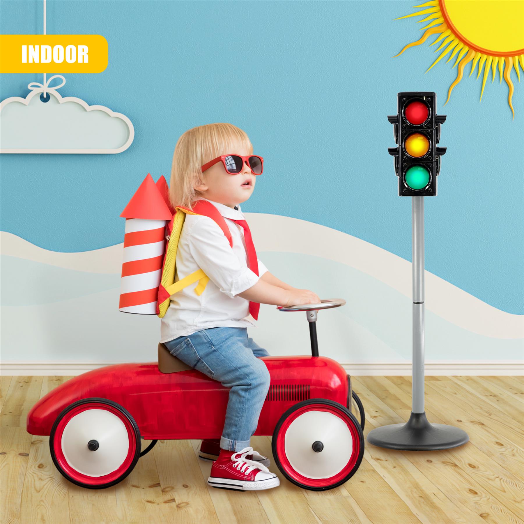 child riding toy car with traffic light - The Magic Toy Shop