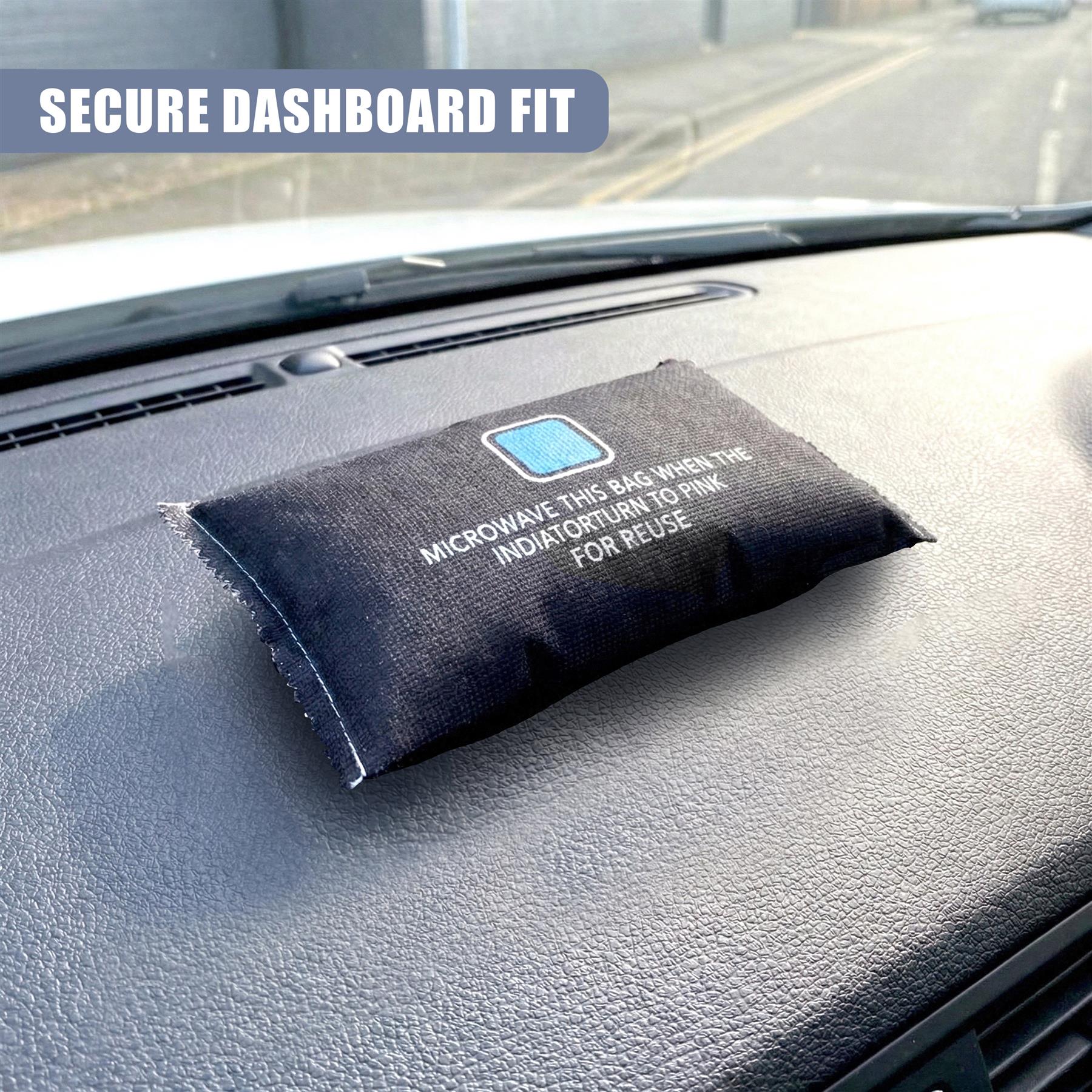 Black fabric bag featuring reheating instructions and a blue indicator patch on a car dashboard.