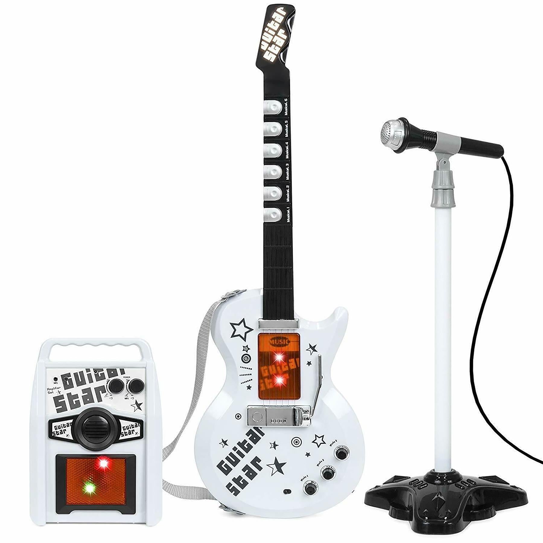 A white electric guitar, small amplifier, and microphone on a stand are arranged together.