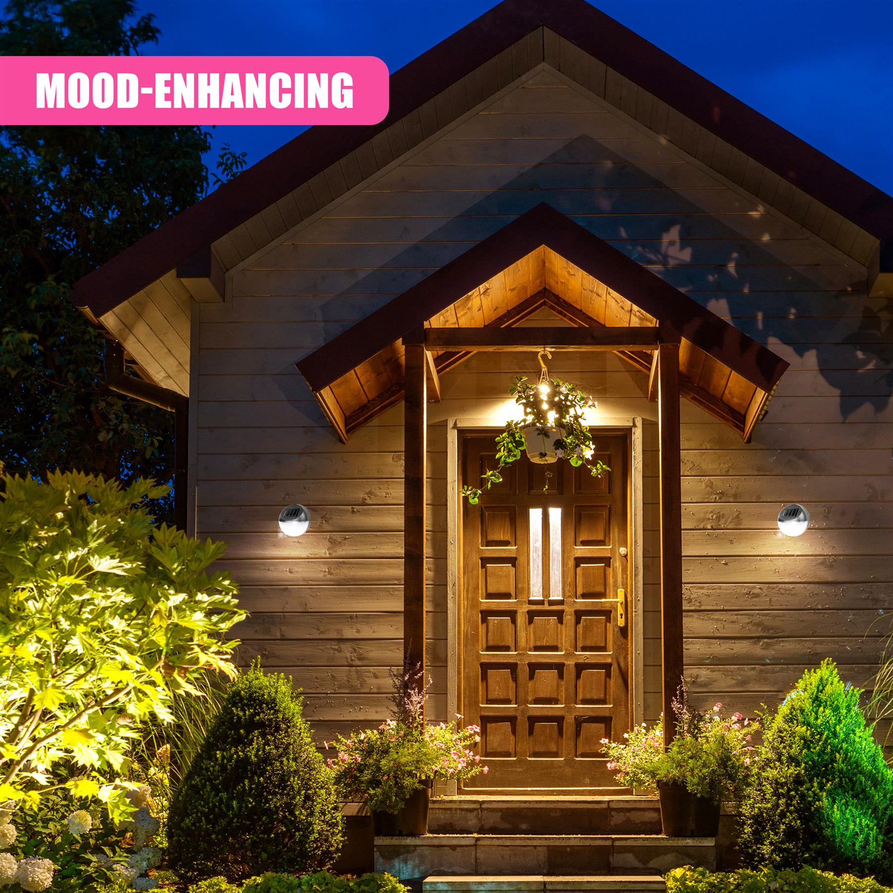 Solar wall lights illuminate the exterior wood facade and entryway of a home.