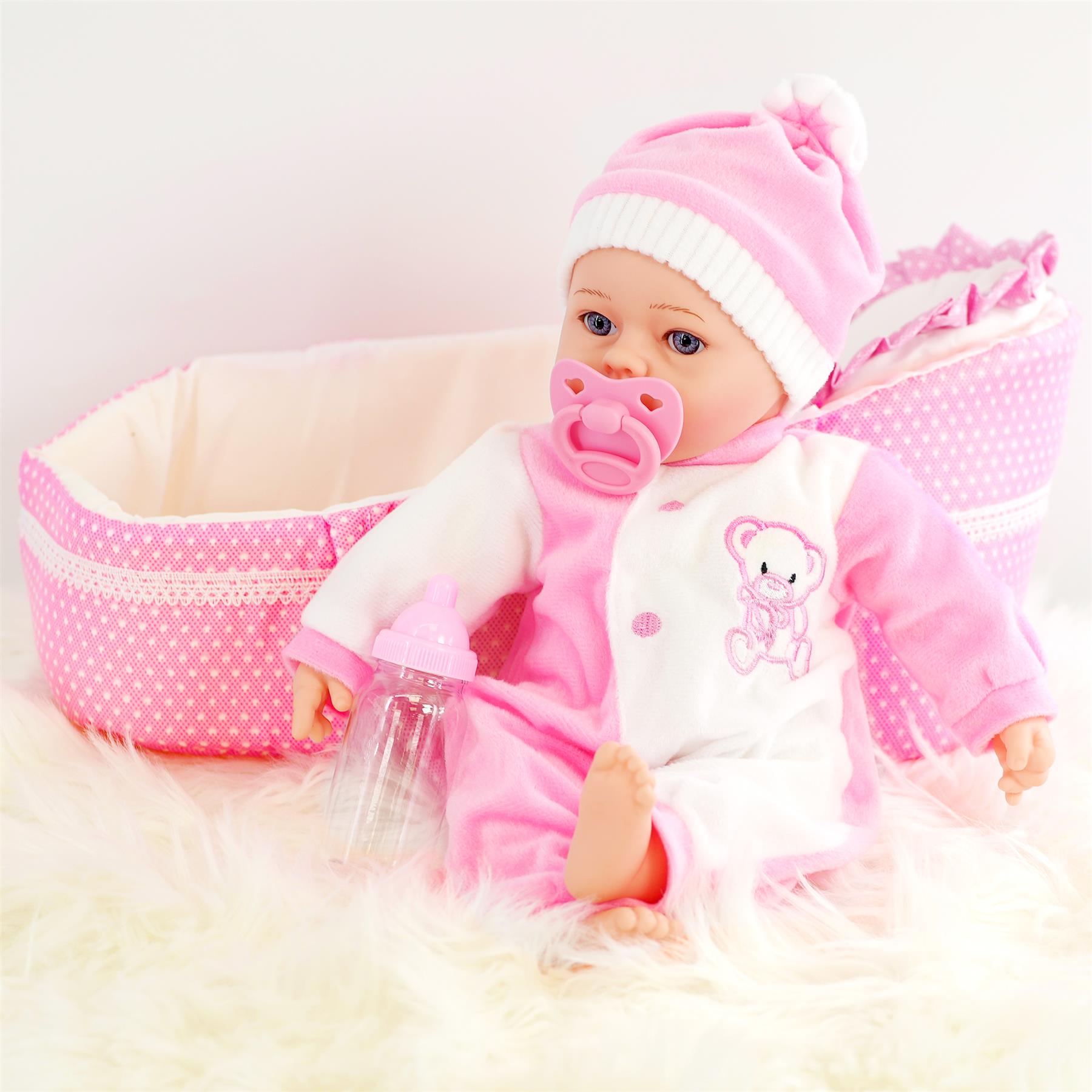 The Magic Toy Shop BiBi Baby Doll in Carry Cot (38 cm / 15")