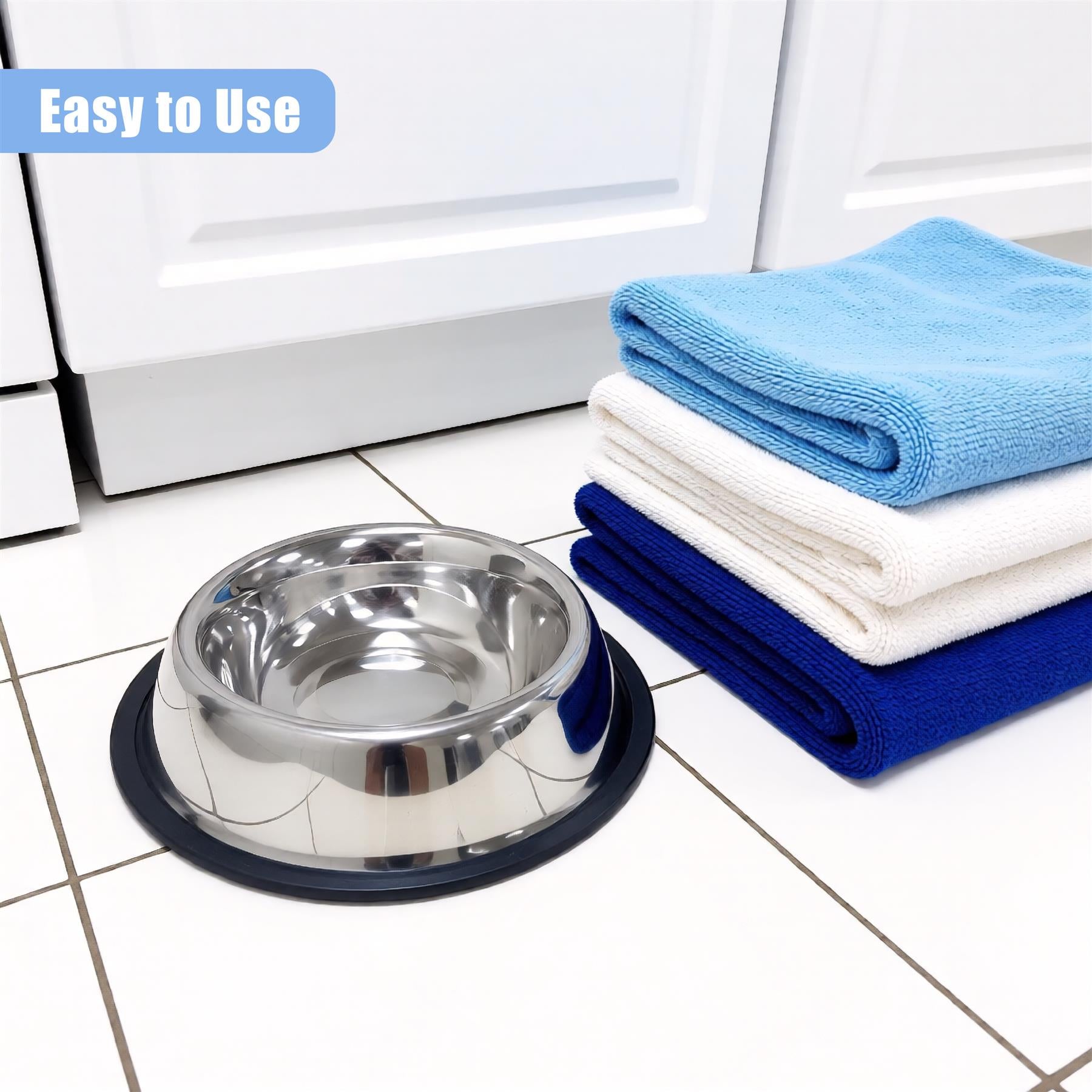 "Shiny chrome pet water bowl, with blue and white towels neatly folded in background." - The Magic Toy Shop