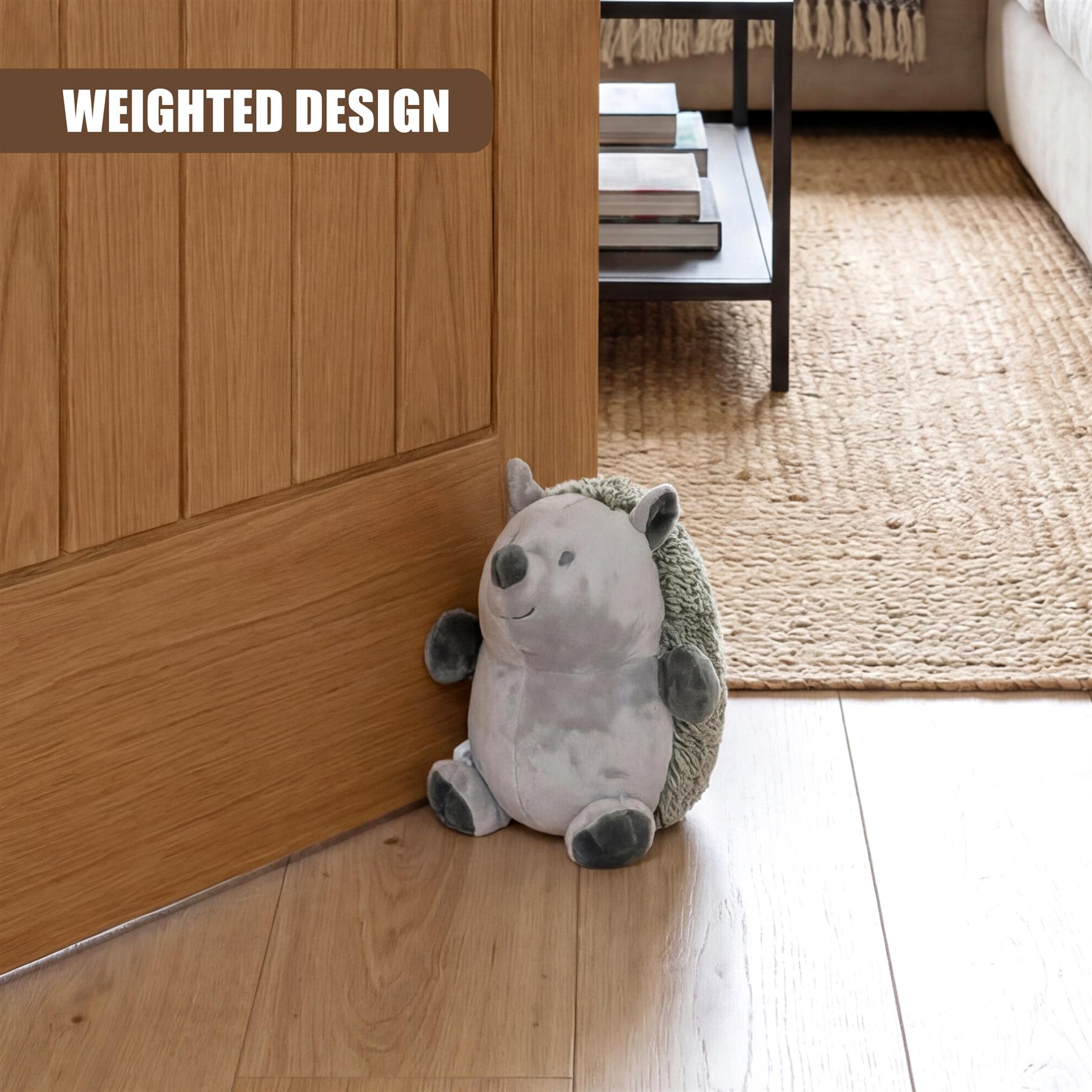 Soft gray hedgehog plush toy used as a door stopper against light wood paneling.