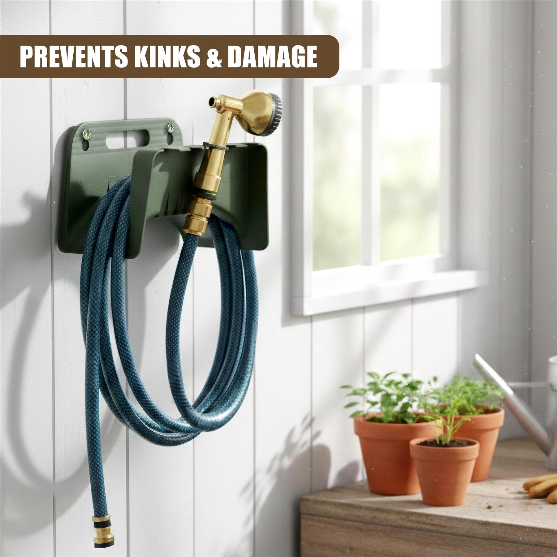 Dark green wall mount holds a coiled blue garden hose attached to a brass spigot.