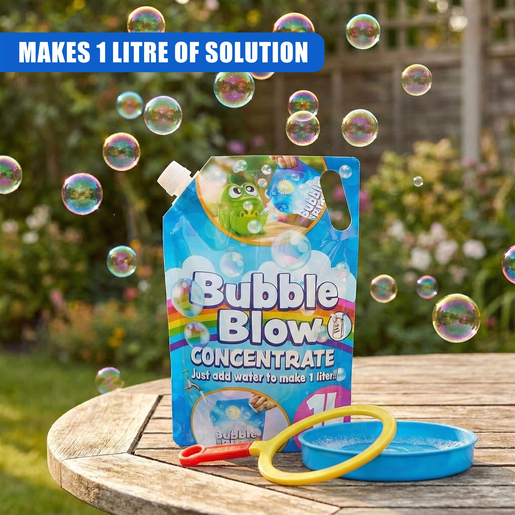 Bubble solution concentrate container, yellow ring, and blue bowl rest on a wooden table surface with soap bubbles.