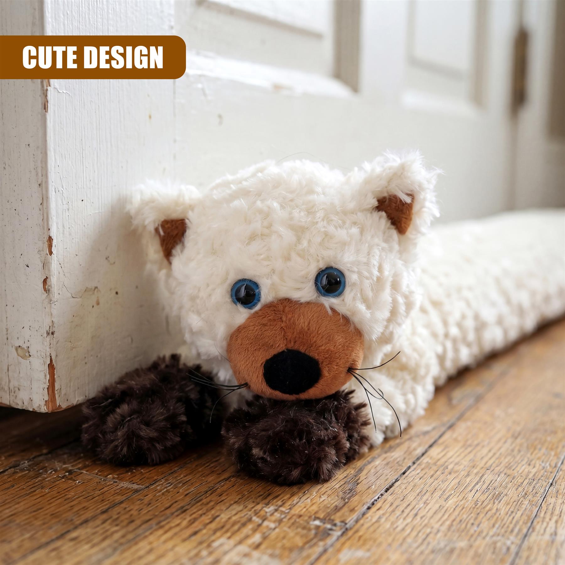 A fluffy cream-colored stuffed bear draught excluder resting on a wooden floor.