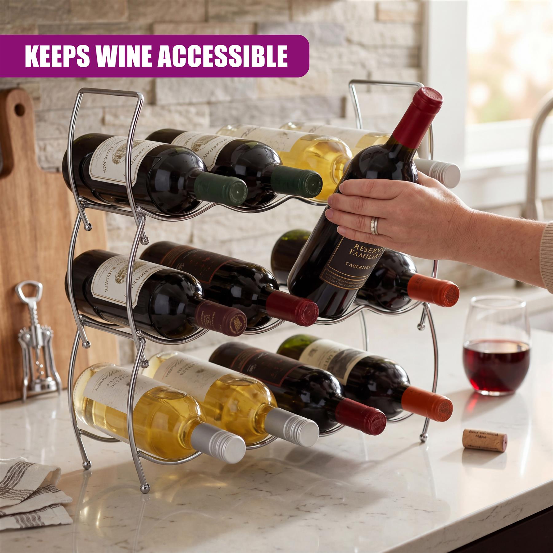 Silver, stacked wine rack holds multiple bottles of wine on a light granite countertop.
