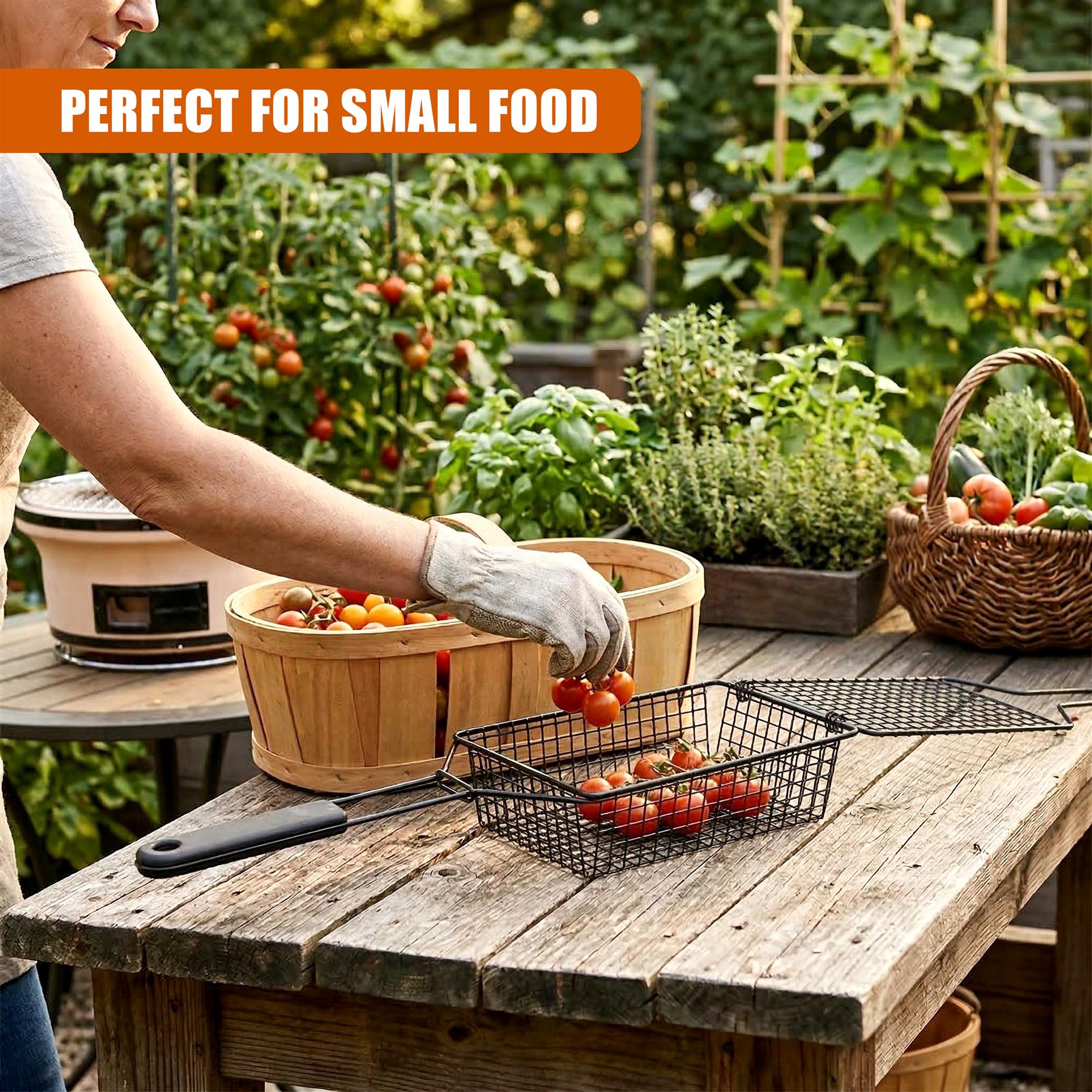 Black wire grilling basket containing sliced tomatoes, resting on a weathered wooden picnic table.