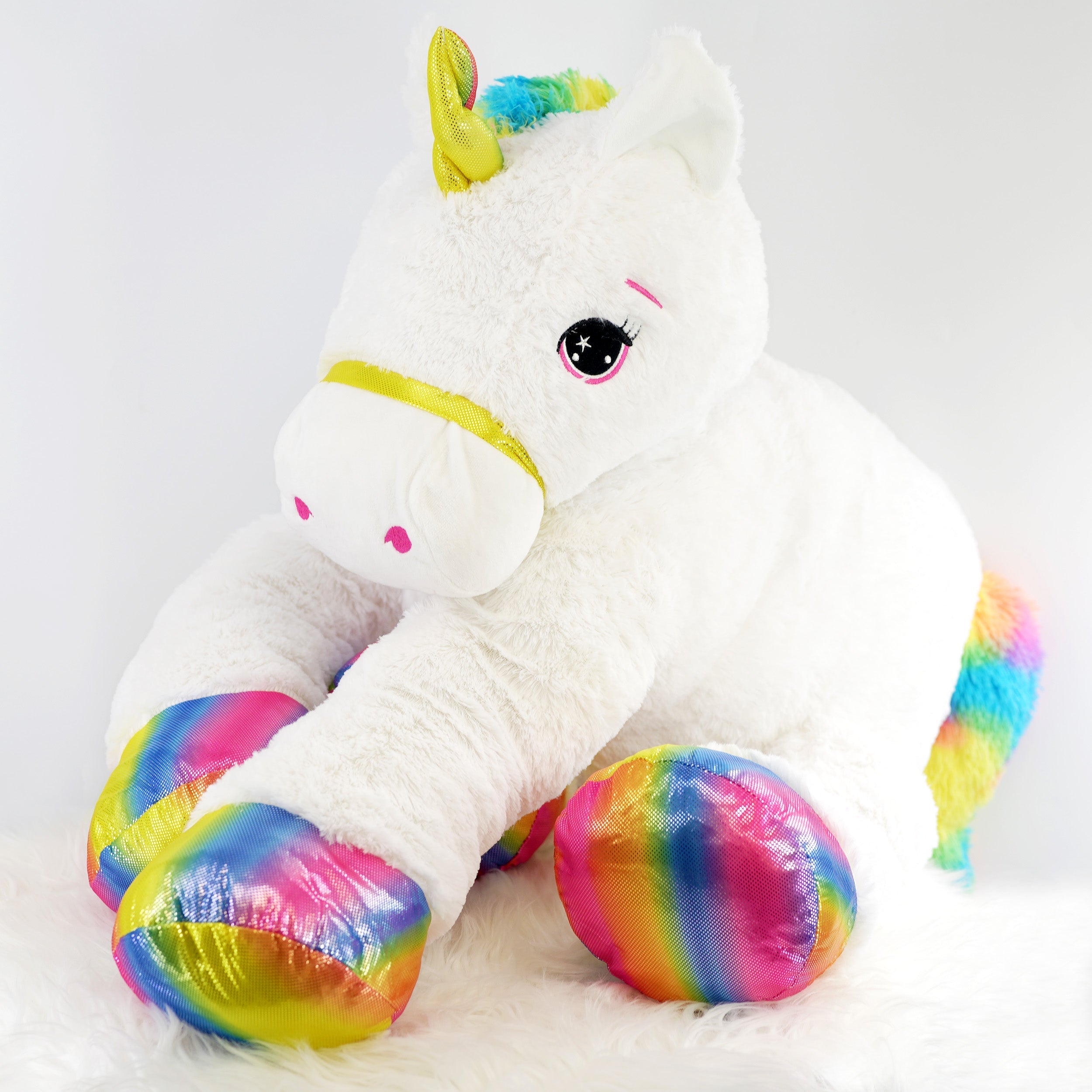 Giant rainbow unicorn on sale stuffed animal